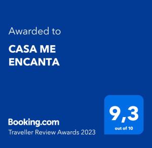 a blue text box with the words awarded to casa me enaciaria at CASA ME ENCANTA in Playa de las Americas