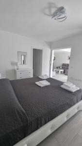 A bed or beds in a room at Casilla de Costa Luxury home