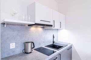 Kuchyň nebo kuchyňský kout v ubytování Brno Center View Apartement B - with self check-in