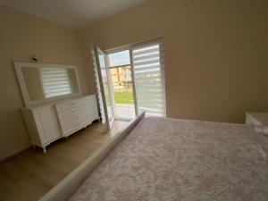 Postel nebo postele na pokoji v ubytování Apartament Jony