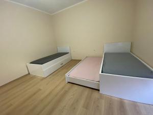 Postel nebo postele na pokoji v ubytování Apartament Jony