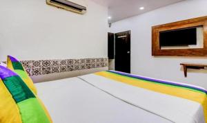 Postel nebo postele na pokoji v ubytování KALPANA RESIDENCY - A Family Hotel