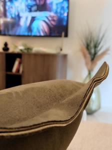 TV a/nebo společenská místnost v ubytování 'Amaryllis Home' ,το σπίτι σας