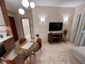TV a/nebo společenská místnost v ubytování 'Amaryllis Home' ,το σπίτι σας
