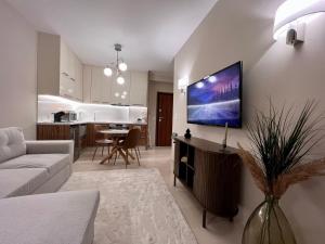 TV a/nebo společenská místnost v ubytování 'Amaryllis Home' ,το σπίτι σας