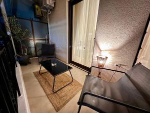 Posezení v ubytování 'Amaryllis Home' ,το σπίτι σας