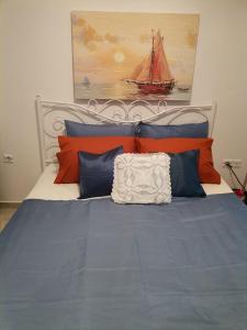 A bed or beds in a room at Seafront Aegean Νest