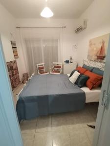 A bed or beds in a room at Seafront Aegean Νest