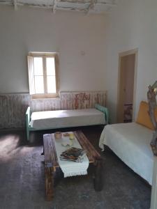 Ένα ή περισσότερα κρεβάτια σε δωμάτιο στο Casa de campo Spaequino La Colorada +11 φωτογραφίες