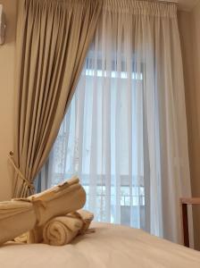 Postel nebo postele na pokoji v ubytování 'Amaryllis Home' ,το σπίτι σας