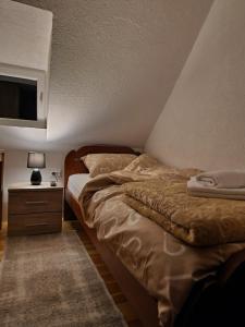 Postel nebo postele na pokoji v ubytování Sobe Baranin Zabljak