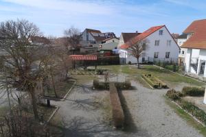 Budova, kde se apartmán nachází + 5 fotografií