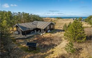 an overhead view of a house with a solar roof at Nice Home In Hirtshals With Wifi in Hirtshals