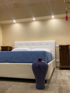 A bed or beds in a room at Solo Vip