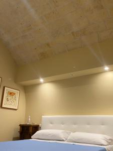 A bed or beds in a room at Solo Vip