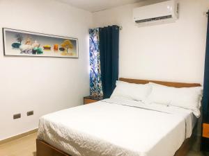 Letto o letti in una camera di Ocean View Apart. In Down town