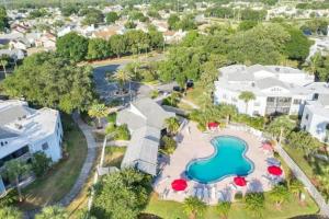 an aerial view of a pool at a resort at Orlando Vacation Apartment 3919 in Orlando