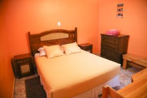 Ένα ή περισσότερα κρεβάτια σε δωμάτιο στο Hostal Chaxa +4 φωτογραφίες