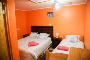 Ένα ή περισσότερα κρεβάτια σε δωμάτιο στο Hostal Chaxa