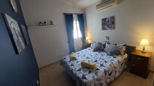 Postel nebo postele na pokoji v ubytování Villa Mondriana