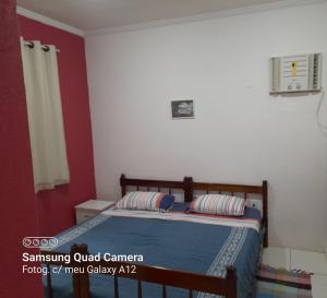 Postel nebo postele na pokoji v ubytování Hospedaria Casa de Maria