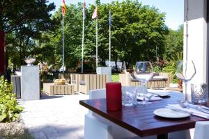 Ein Restaurant oder anderes Speiselokal in der Unterkunft Leonardo Royal Hotel Den Haag Promenade 