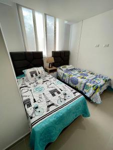 Postel nebo postele na pokoji v ubytování Moderno y cómodo apartamento en Puerta del Sol