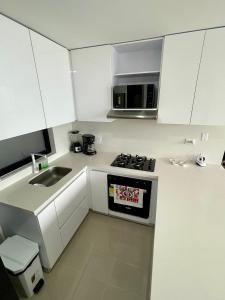 Kuchyň nebo kuchyňský kout v ubytování Moderno y cómodo apartamento en Puerta del Sol