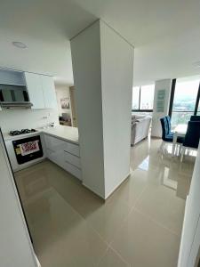 Kuchyň nebo kuchyňský kout v ubytování Moderno y cómodo apartamento en Puerta del Sol