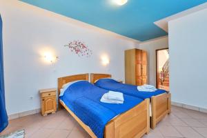 Postel nebo postele na pokoji v ubytování Rooms with a parking space Veli Losinj, Losinj - 21045