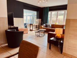 A seating area at Spacious house in Moulin du Ruy with sauna and indoor pool