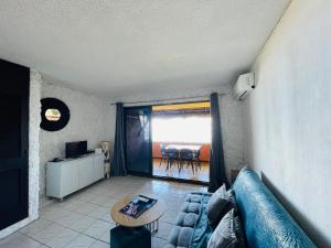 Posezení v ubytování OLotus Studio Punaauia