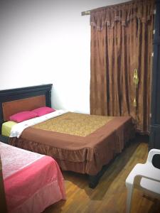 Letto o letti in una camera di Don Pablo