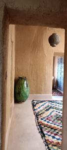 Postel nebo postele na pokoji v ubytování Kasbah ait Moussa
