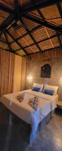 Ένα ή περισσότερα κρεβάτια σε δωμάτιο στο Asian Secret Resort