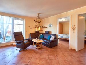 Posezení v ubytování Dünenresidenz Königin Augusta - Apt. 17 + 20 fotografií