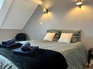 Posteľ alebo postele v izbe v ubytovaní Gîte Les Hauts de Boulogne