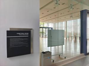 a museum with a sign in the middle of a room at A2105 Grand Medini Princess100mbps Netflix By STAY in Nusajaya +23 photos