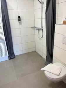 Koupelna v ubytování Gästehaus Forggensee