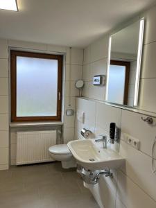 Koupelna v ubytování Gästehaus Forggensee