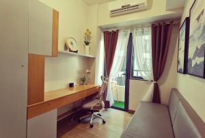 TV o dispositivi per l'intrattenimento presso Condominium at Spring Residences near Airport