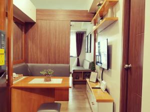 TV o dispositivi per l'intrattenimento presso Condominium at Spring Residences near Airport