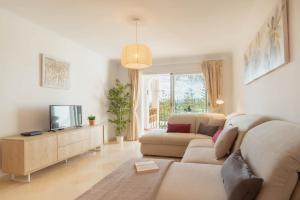 TV a/nebo společenská místnost v ubytování Fairway Apartman Mijas Golf 1 - Golondrinas
