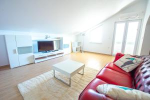 Μια τηλεόραση ή/και κέντρο ψυχαγωγίας στο Garden Resort - Apartments Lavanda