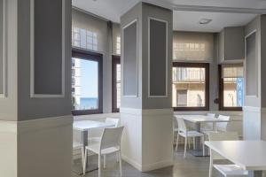 Restauracja lub miejsce do jedzenia w obiekcie Pensión Alemana