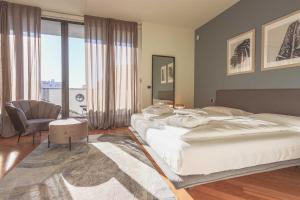 מיטה או מיטות בחדר ב-AR Prestige Penthouse - Soho