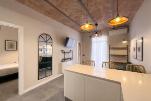 Televízia a/alebo spoločenská miestnosť v ubytovaní BeBarceloner Sants Apartments - 2 bedrooms