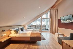 Posteľ alebo postele v izbe v ubytovaní Genuss- & Aktivhotel Sonnenburg