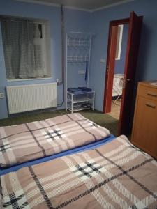 Postel nebo postele na pokoji v ubytování Ubytováni v soukromí Na Podluží
