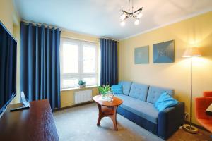 Posedenie v ubytovaní OnHoliday Apartamenty w Hotelu przy ul Kościuszki 16